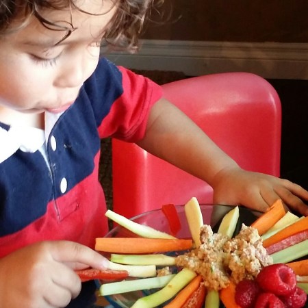 bodhi eating carrot platter